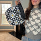 The Roni Nylon Crossbody - Black Gingham Daisy Floral
